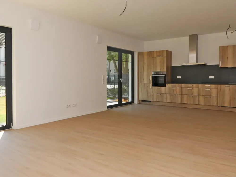 Spacious 3-Room New-Build Apartment with Small Garden