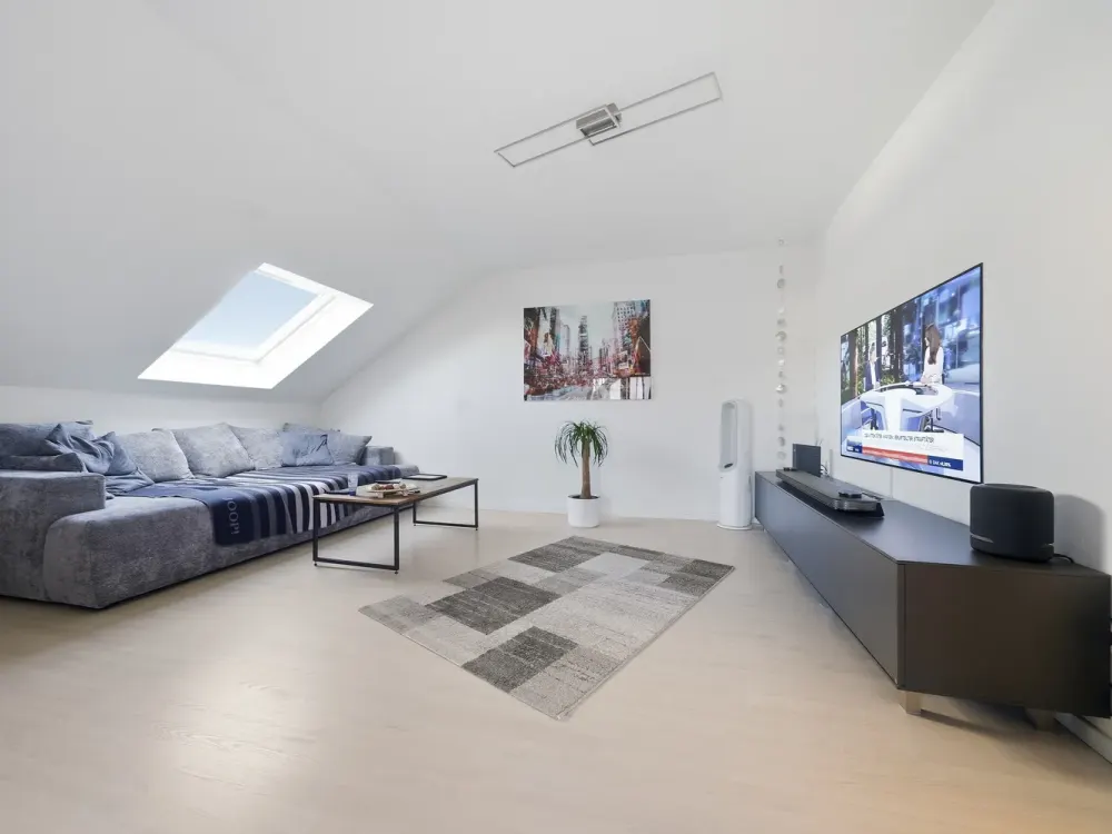 Renovated Top-Floor Apartment with Balcony, Parking Space & Large Cellar in Modernized 3-Family House