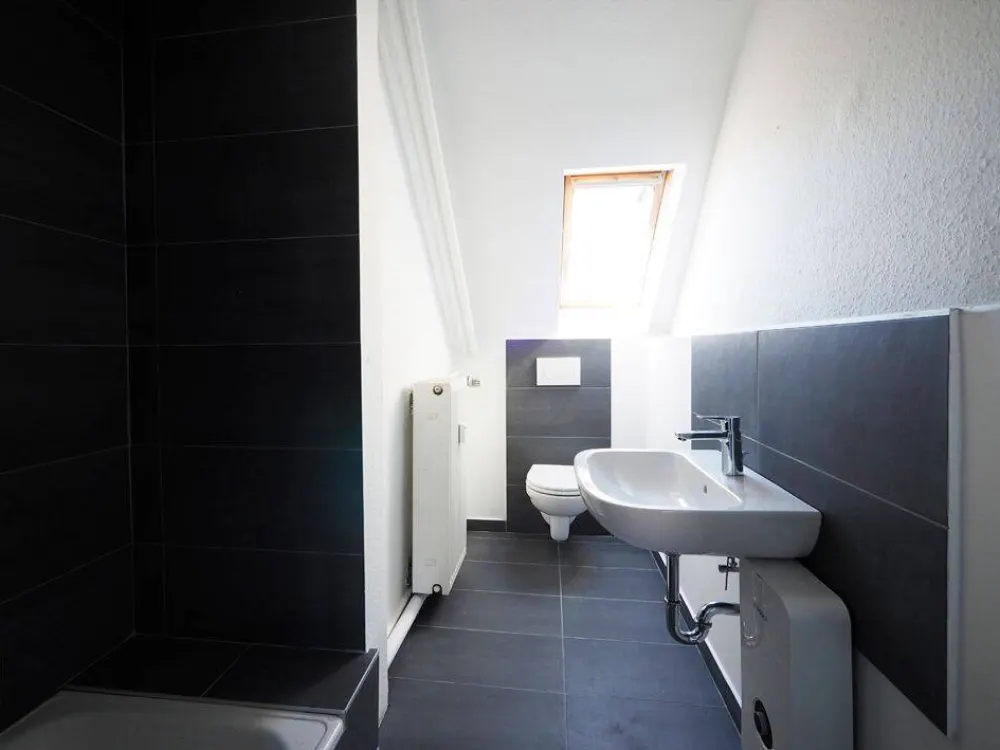 Bright Four-Room Attic Apartment in St.Johann!