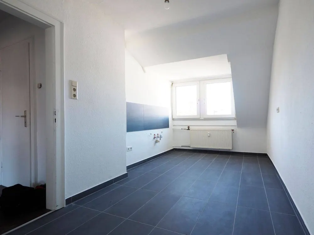 Bright Four-Room Attic Apartment in St.Johann!