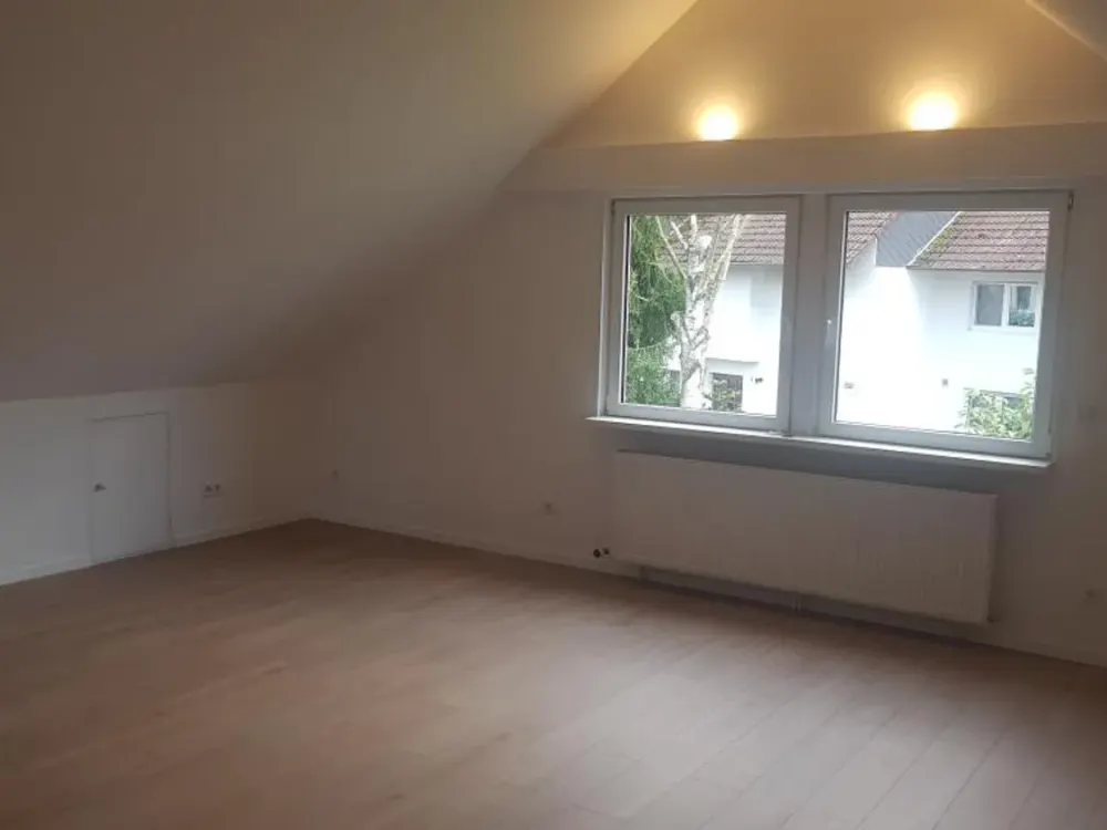 Attractive 2-Room Attic Apartment with Fitted Kitchen in Bruchköbel