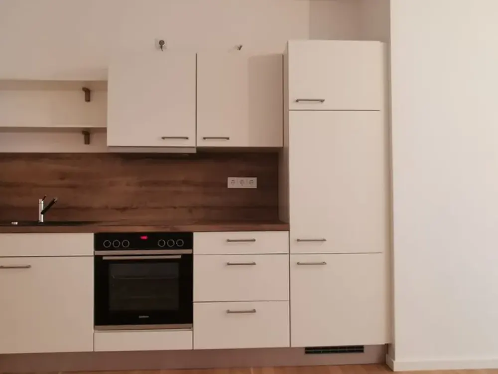 Neuwertige mit EBK und Garten: stilvolle 2-Zimmer-EG. Westbahnhof 2 Minute zu Fuß