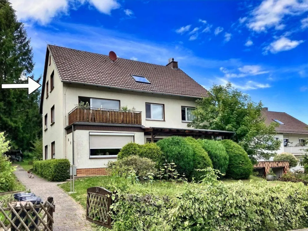 Stilvolle 4-Zimmer-Wohnung mit Garten in begehrter Waldrandlage