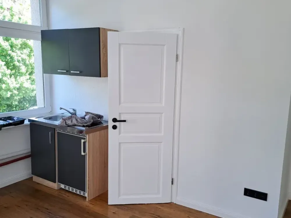 Bright Micro Apartment in a Historic Building Near the Old Town