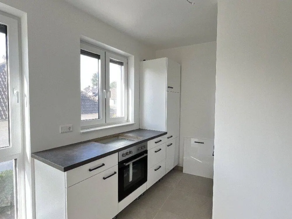First occupancy: 2-room apartment with balcony and fitted kitchen