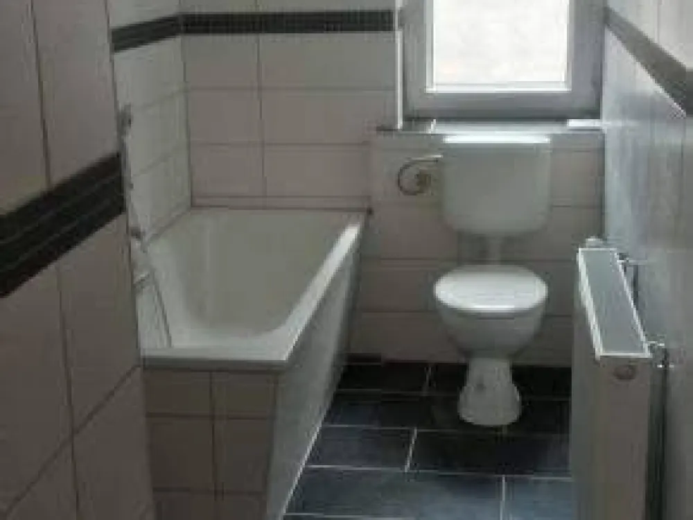 Cozy 3-room apartment, on the ground floor, with balcony and fitted kitchen