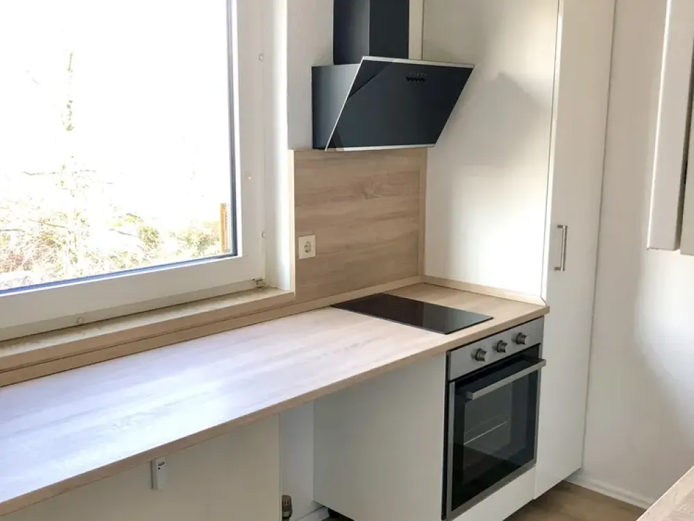 Bright, well-maintained 2-room apartment with sunny balcony in a quiet location