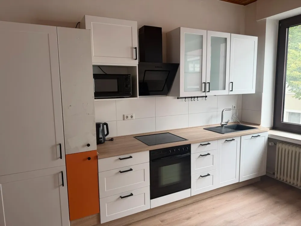 2-Room Apartment with Kitchen and Parking Space in the Center Available Immediately