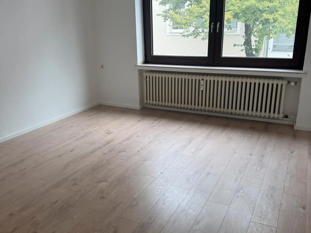 2-Room Apartment with Kitchen and Parking Space in the Center Available Immediately