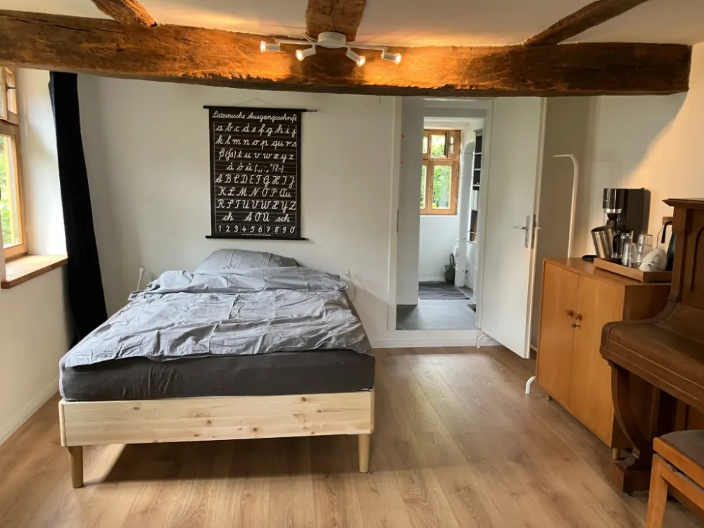 Kaufungen | Quiet Furnished Apartment in Historic Half-Timbered House by the River