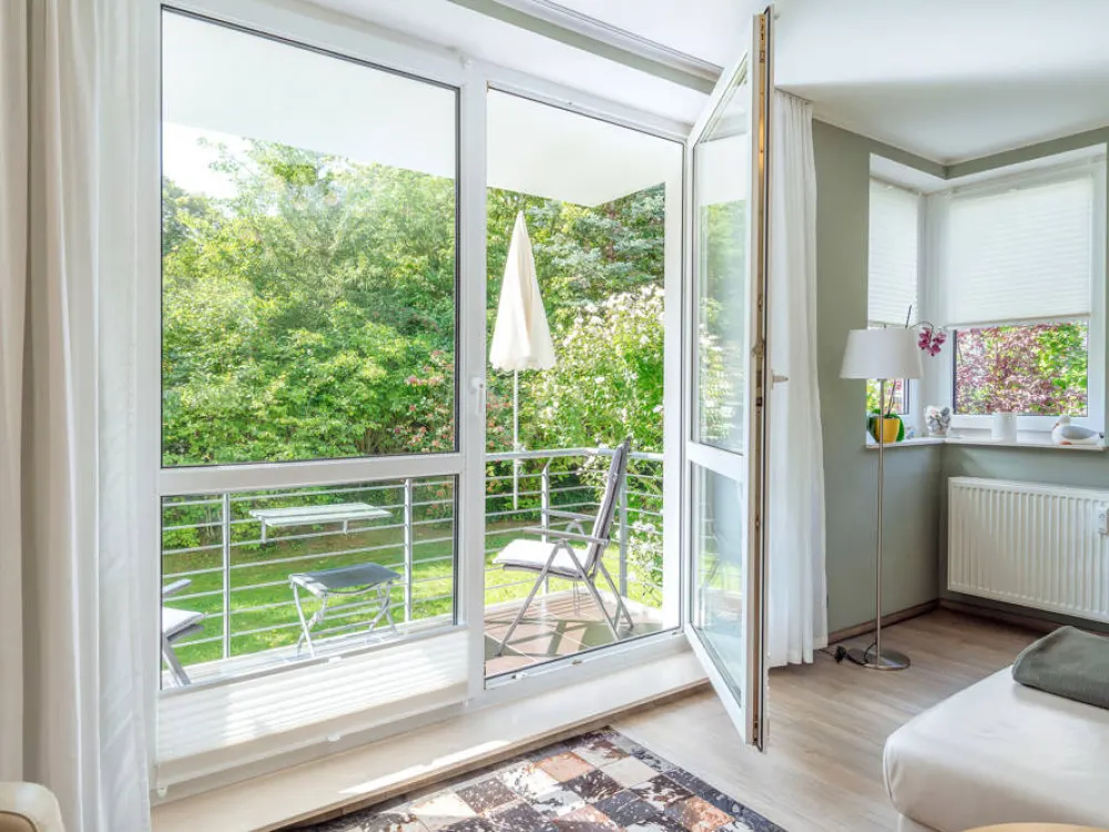 WARNEMÜNDE I furnished, wonderful modern 3-room apartment with south-facing balcony and underground parking space