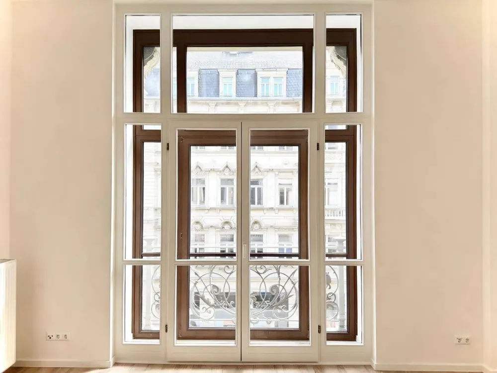 Renovated Old Building Charm with Elegant Balcony Access