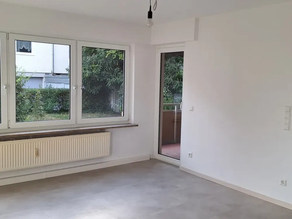 First Rental After Comprehensive Renovation, Modern 3.5-Room Ground Floor Apartment with Balcony in WN