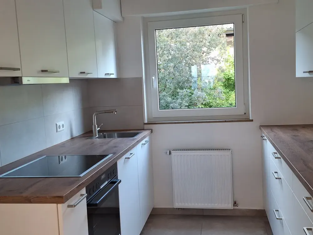 First Rental After Comprehensive Renovation, Modern 3.5-Room Ground Floor Apartment with Balcony in WN