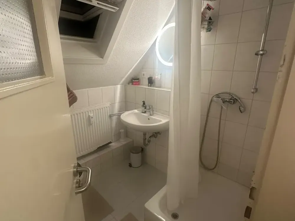 Stuttgart Ost: 2-Room Attic Apartment with Practical Layout